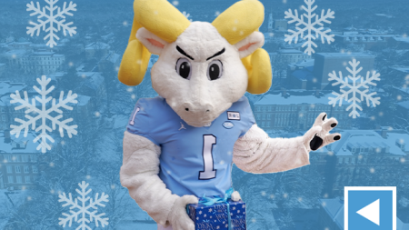 Photo of Rameses holding a gift atop a graphic reading: 